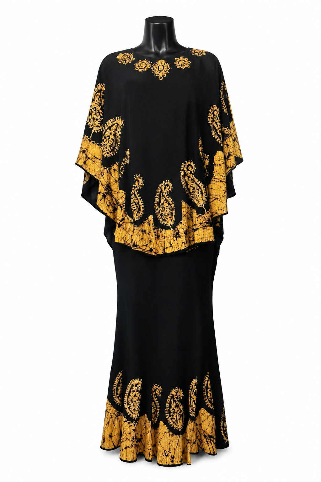A black two-piece dress set displayed on a black mannequin against a white background. The top is a loose, draped tunic with wide sleeves, and the bottom is a fitted maxi skirt.