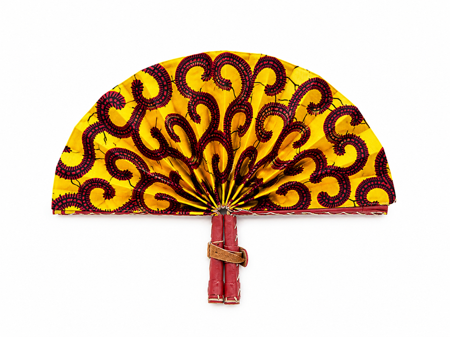 A traditional folding hand fan with a yellow and dark red patterned fabric canopy and red handles, shown against a plain white background.