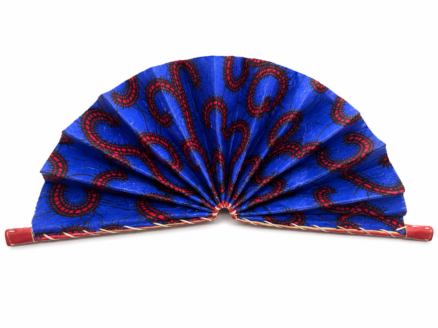 A traditional folding hand fan with a vibrant blue fabric decorated with a red and black wavy pattern, featuring red wooden handles.